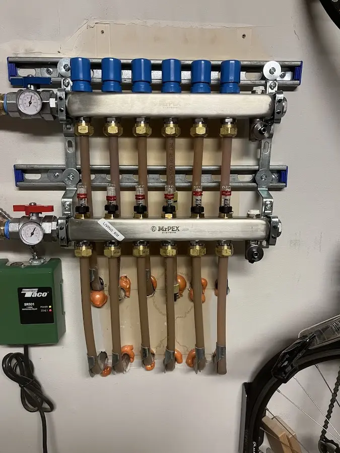 Plumber performing Leak Detection at a residential property in New Baltimore